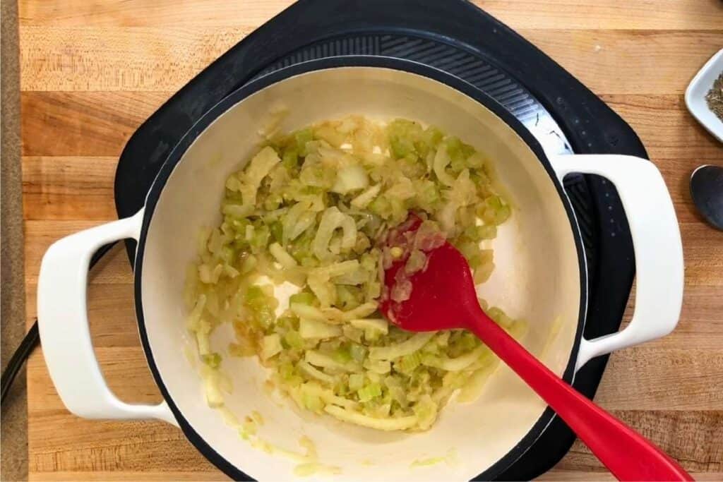 Add the diced onion, celery, and fennel, then cook for about 5 to 6 minutes until softened and lightly translucent.